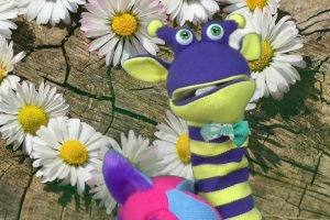 Na zdjęciu pacynki Bibliuś i Woluminka